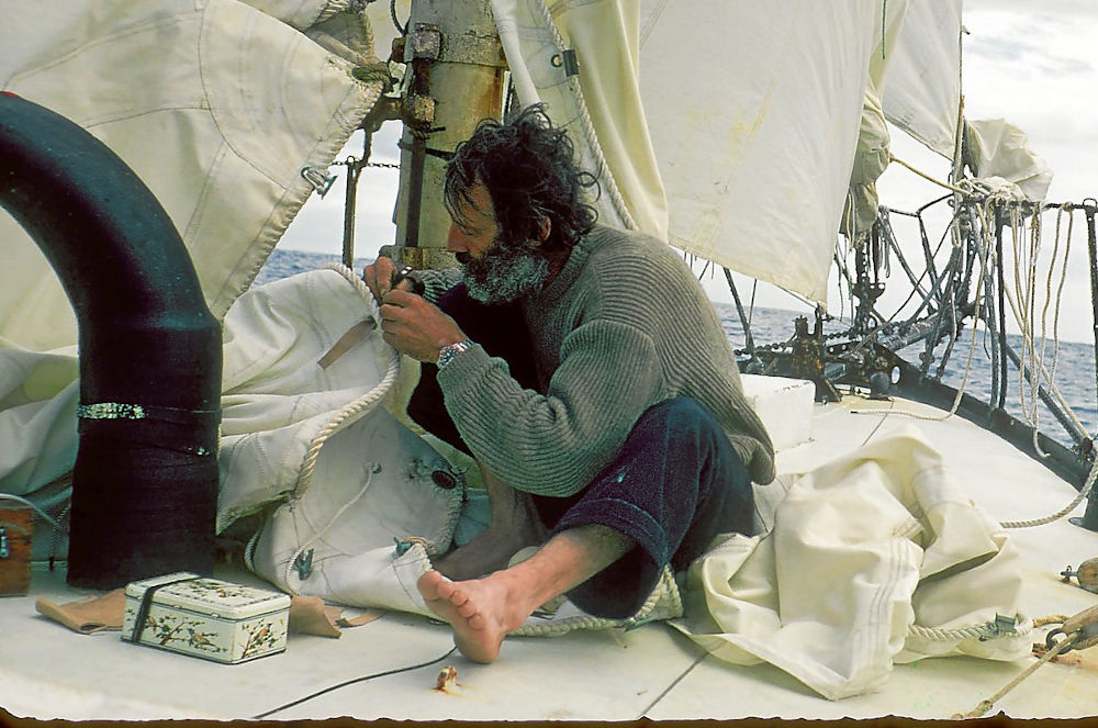 Bernard Moitessier repairing his sails